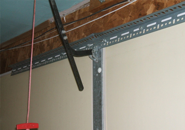 garage door bracket repair in in Sun Valley